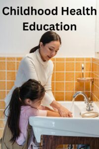 Happy child washing hands with soap in a clean bathroom